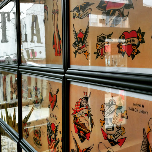 Explore cover up tattoo ideas for females, creative tattoo ideas in Pittsburgh, available at Atlas and Anchor Tattoo