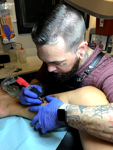 Explore neck word tattoo ideas, creative tattoo ideas in Myrtle Beach, available at Elite Ink Tattoos of Myrtle Beach