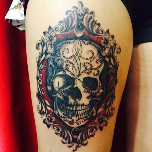 Explore tattoo cover up ideas for upper back, creative tattoo ideas in San Diego, available at Sideshow Tattoo and Piercing