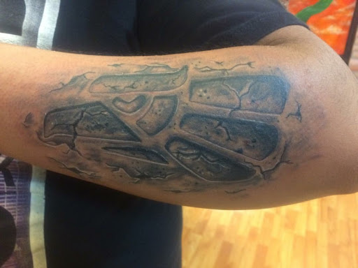 Explore running tattoo ideas, creative tattoo ideas in Midlothian, available at Firehouse Tattoos