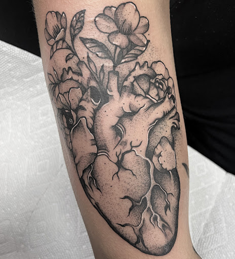 Explore mens face tattoos ideas, creative tattoo ideas in Sykesville, available at Red and Blue Tattoo