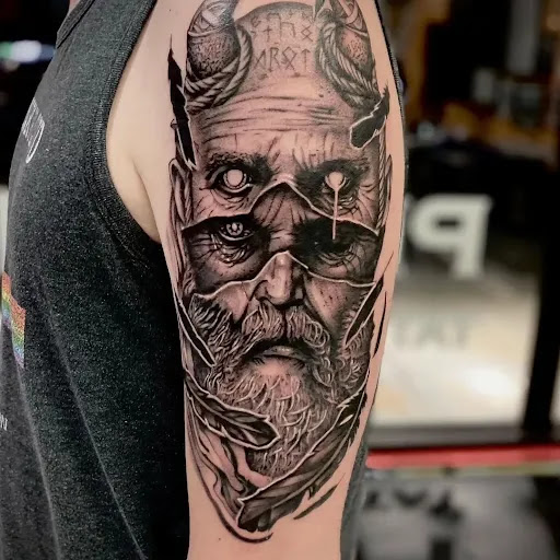 Explore broken tattoo ideas for guys, creative tattoo ideas in Abington, available at Tattoo Galaxy (Abington) Piercing and Custom Tattoos