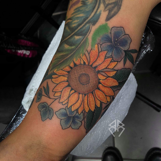 Explore tattoo ideas for son on dad, creative tattoo ideas in Cordova, available at The Rook x Raven Tattoo Creative