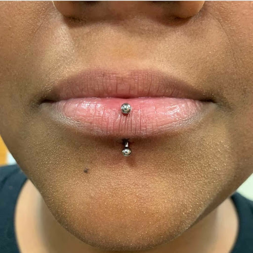 Explore suicidal tattoo ideas, creative tattoo ideas in Summerville, available at Exotic Impressions Body Piercing