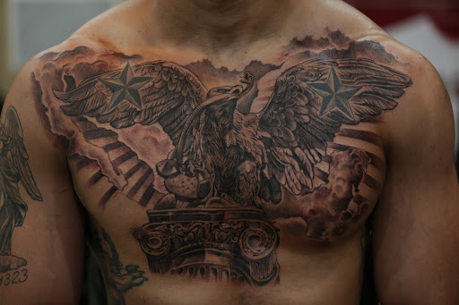 Explore cool hand tattoo ideas, creative tattoo ideas in Fountain Valley, available at Lowrider Tattoo Studios