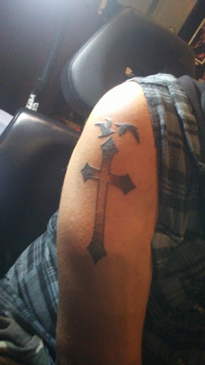 Explore zipper tattoo ideas, creative tattoo ideas in Dubuque, available at Dubuque Tattoo Club LLC.