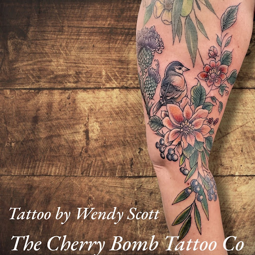 Explore tomahawk tattoo ideas, creative tattoo ideas in Lees Summit, available at The Cherry Bomb Tattoo Co.