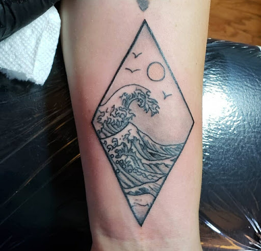 Explore bruce lee tattoo ideas, creative tattoo ideas in Milford, available at Golden Hammer Tattoo Studios