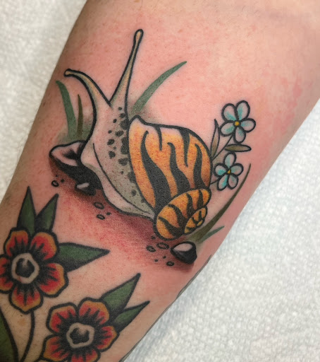 Explore axe tattoo ideas, creative tattoo ideas in Muncie, available at Fox & Sparrow Tattoo