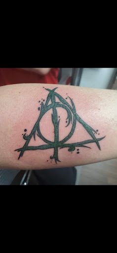 Explore self tattoo ideas, creative tattoo ideas in Wake Forest, available at Revelation Ink Tattoo and Piercing