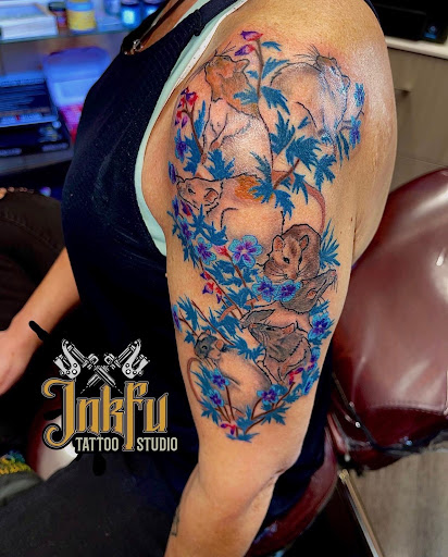 Explore cover up tattoo ideas for men, creative tattoo ideas in Omaha, available at Inkfu Tattoo Studio