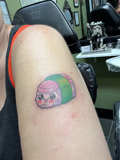 Explore foo fighters tattoo ideas, creative tattoo ideas in Ormond Beach, available at Tropical Tattoo Inc