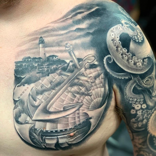 Explore mens elbow tattoo ideas, creative tattoo ideas in Maryland Heights, available at Thirteen Roses Tattoo & Aesthetics