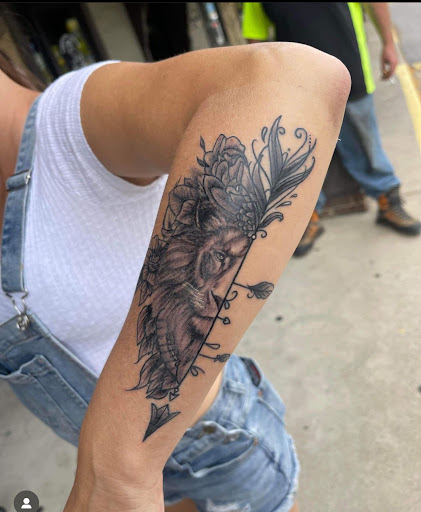Explore tattoo ideas on the thigh, creative tattoo ideas in Fort Wayne, available at Grade A Tattoos and Body Piercing