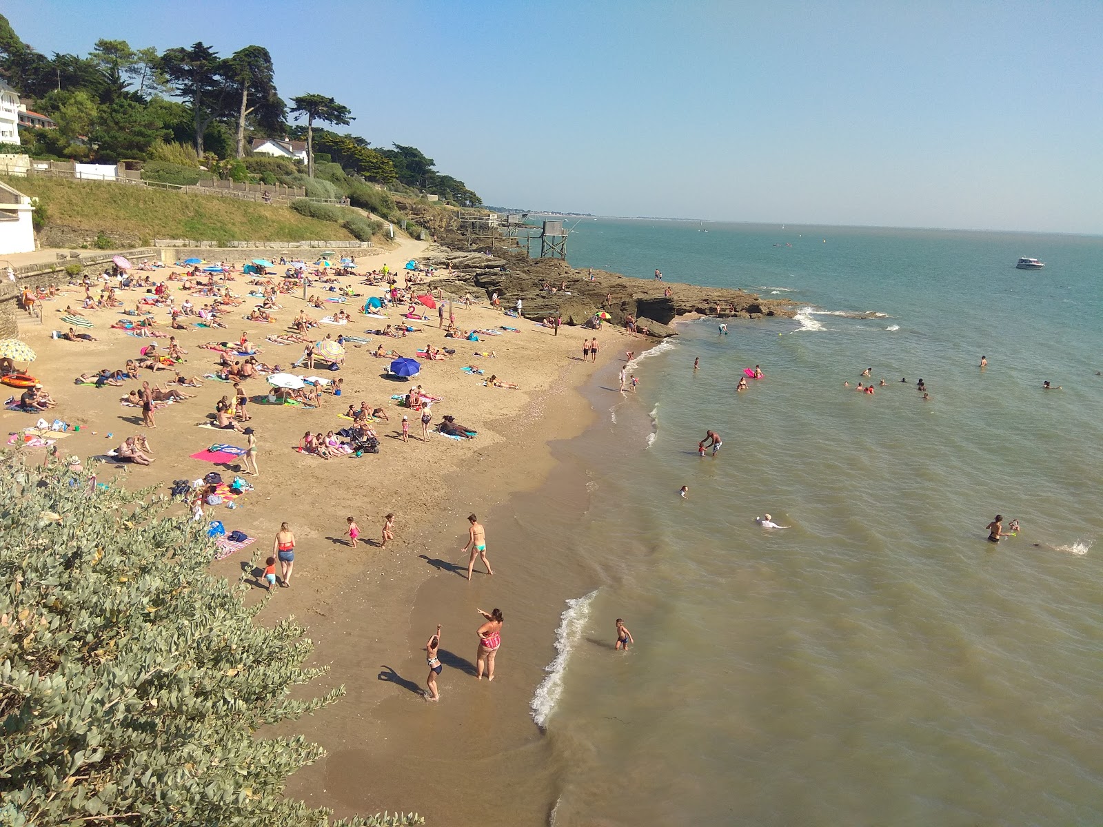 Φωτογραφία του Source beach με φωτεινή άμμος επιφάνεια