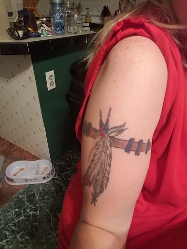 Find palm size tattoo ideas for females for your next unique tattoo in Princeton at Wolfman Tattoos and Piercings