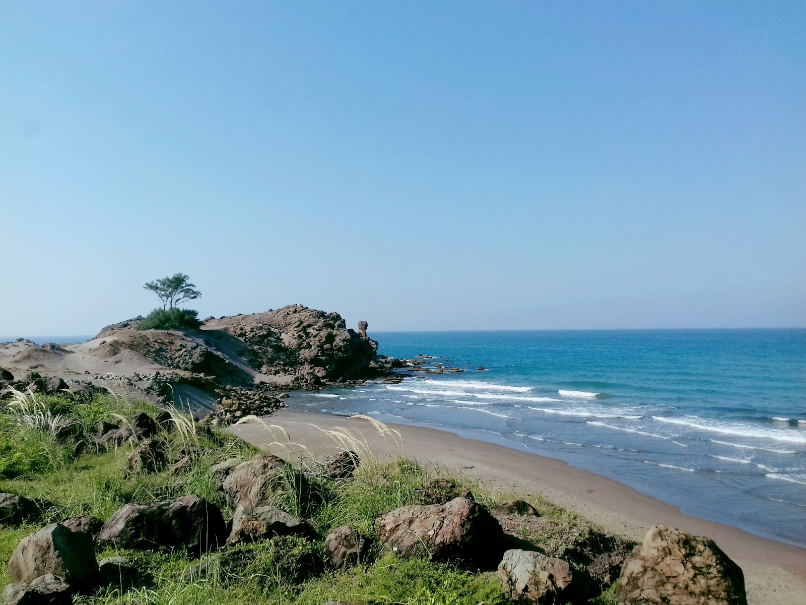 Foto von Playa Munecos mit mittlere buchten