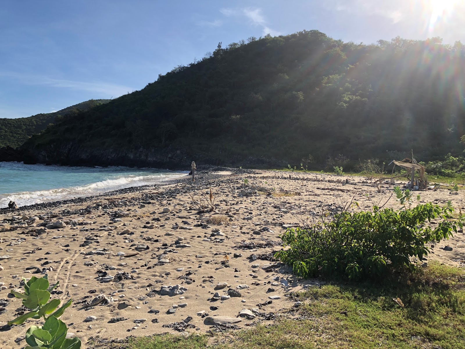 Photo of Duck's beach with turquoise water surface