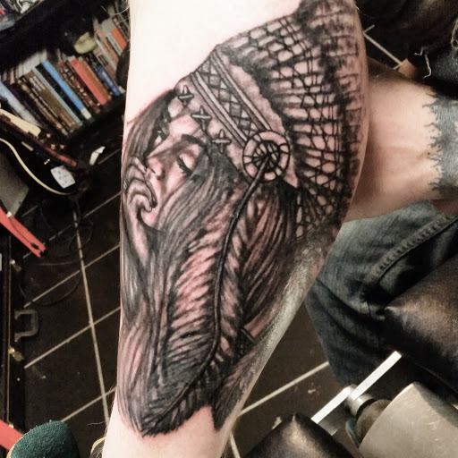 Explore american traditional elbow tattoo ideas, creative tattoo ideas in Erie, available at EliKingInk