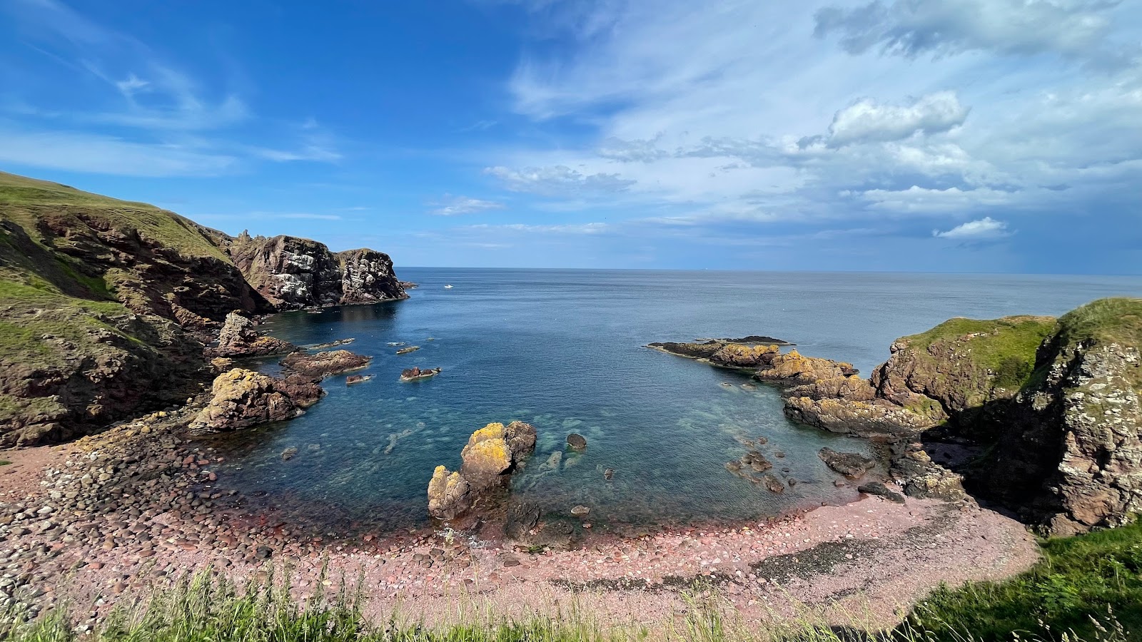 Foto di Starney Bay con una superficie del terreno roccioso