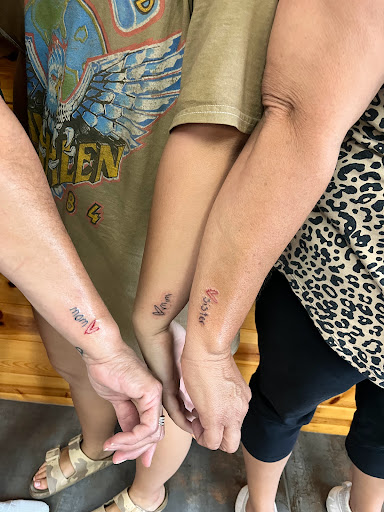 Explore rip tattoo ideas for females, creative tattoo ideas in Foley, available at Symbolic Ink Tattoo Studio