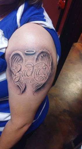 Explore front neck tattoo ideas, creative tattoo ideas in San Angelo, available at Inkland Tattoo Studio