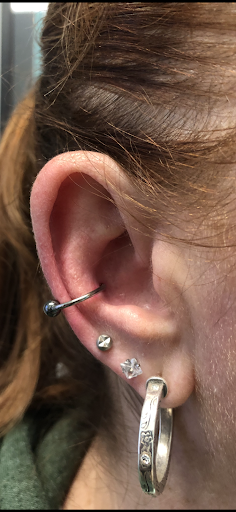 Explore singing tattoo ideas, creative tattoo ideas in West Chester, available at Piercing by Jacqueline at X-Treme Ink Tattoo