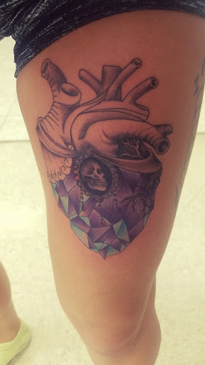 Explore big flower tattoo ideas, creative tattoo ideas in Winona, available at Red Wing Tattoo