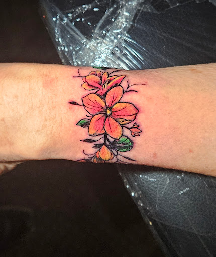 Explore hot girl tattoo ideas, creative tattoo ideas in Angola, available at Hoodlum Ink