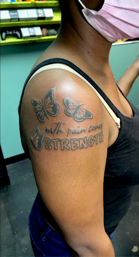 Explore spine tattoo ideas for men, creative tattoo ideas in Meridian, available at Creative Pain Tattoo Studio