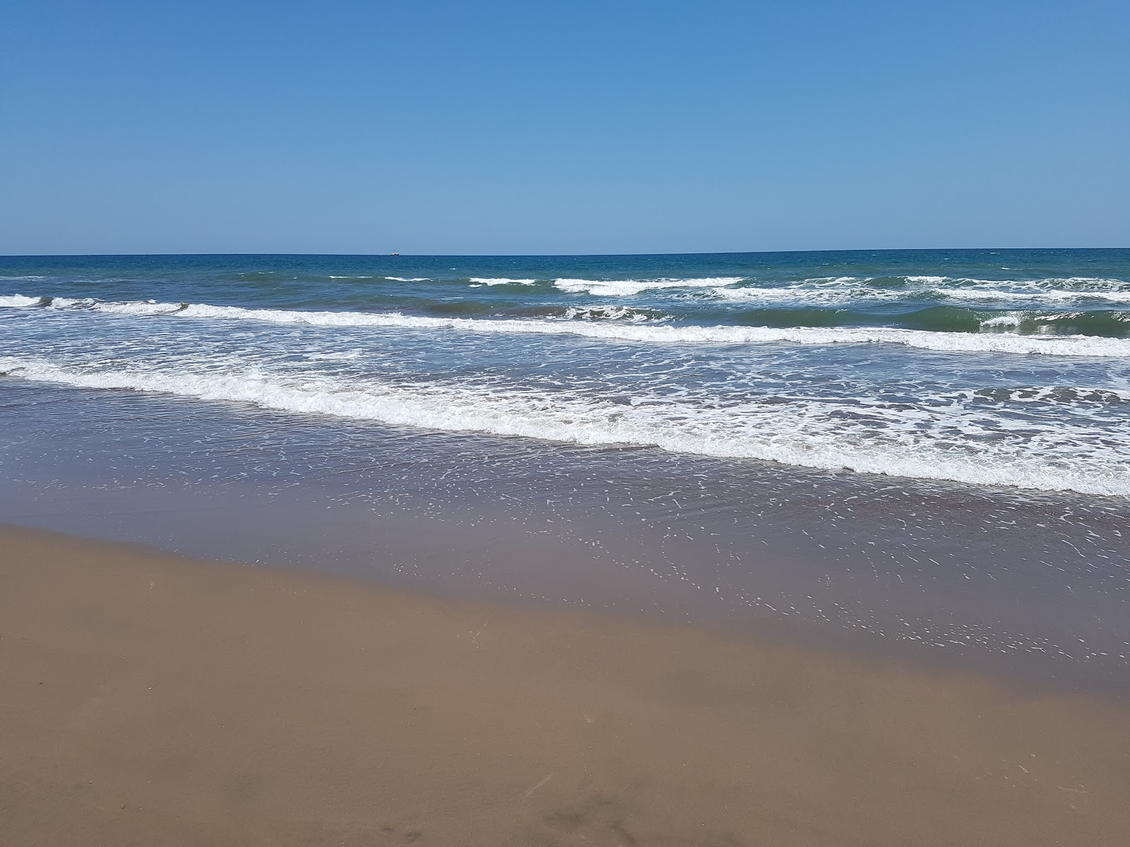 Photo of Huatabampito beach with turquoise water surface