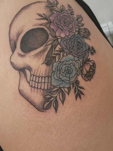 Explore tattoo ideas for book lovers, creative tattoo ideas in Springfield, available at Nuclear Crayon Tattoo & Piercing