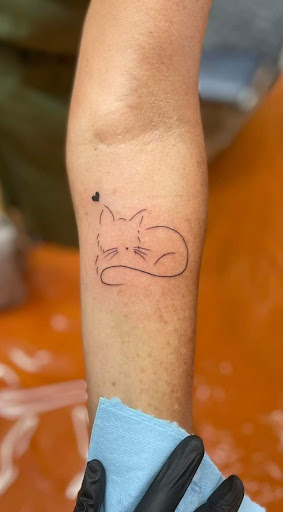 Explore globe tattoo ideas, creative tattoo ideas in Benton, available at Spectrum Tattoo