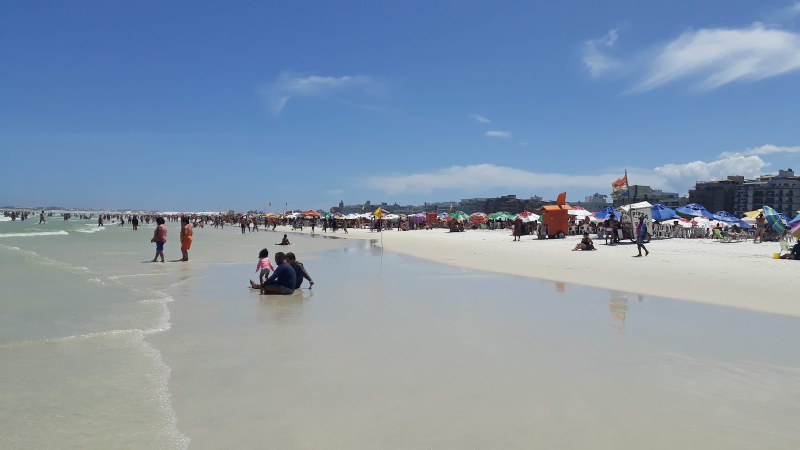 Foto de Playa de las Dunas con agua cristalina superficie