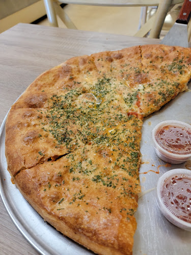 #2 best pizza place in Cordova - Mola’s Pizza