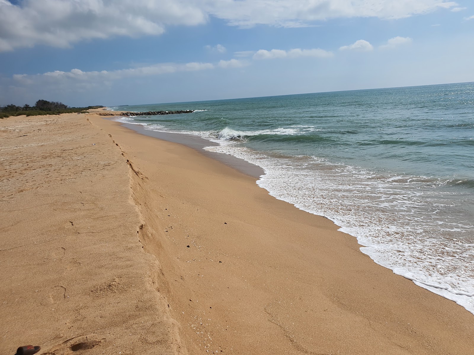 Foto van Kundal Beach met ruim strand
