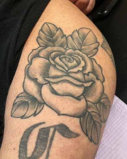 Explore tattoo ideas for multiple names, creative tattoo ideas in Frisco, available at Frisco Tattoo Company - Steel PaintBrush