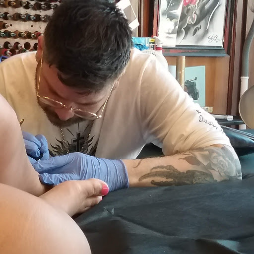 Tattoo Shop «Hearts of Fire Tattoo», reviews and photos, 212 W McDaniel St, Springfield, MO 65806, USA