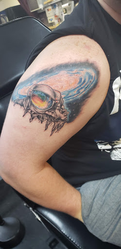 Explore shoulder tattoo ideas for guys, creative tattoo ideas in Hilliard, available at 22 Caliber Tattoo Mega Studio