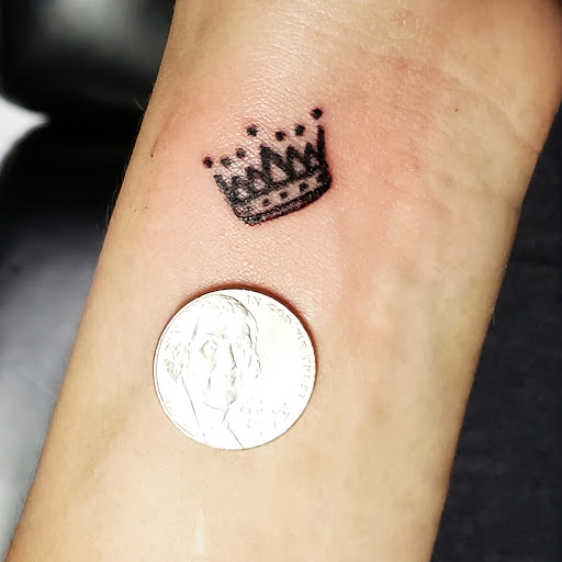 Explore one piece tattoo ideas for guys, creative tattoo ideas in Erie, available at EliKingInk