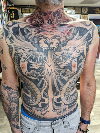 Explore male chest tattoo ideas, creative tattoo ideas in Raleigh, available at Inkability Tattoo