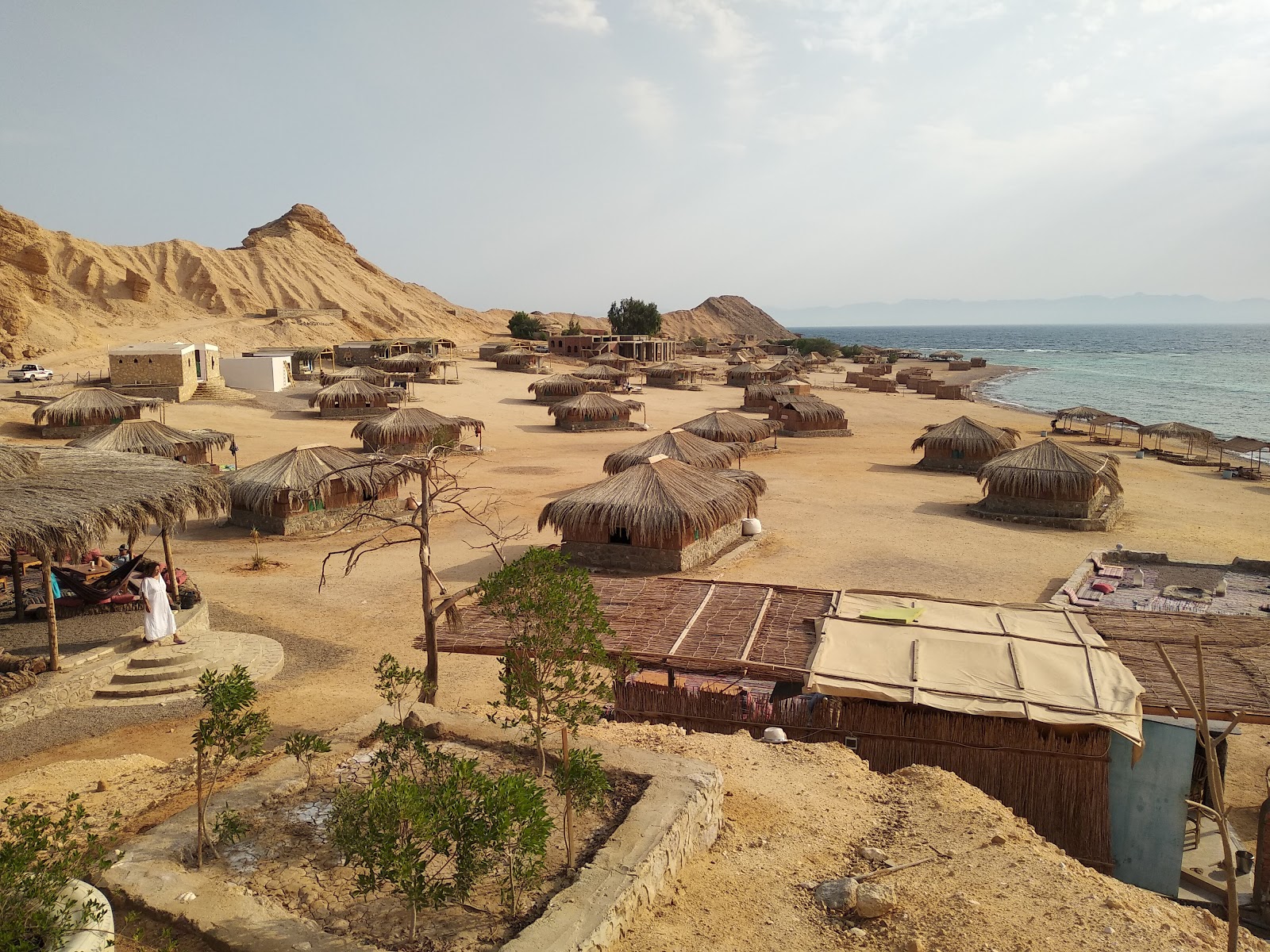 Ras Shaitan beach'in fotoğrafı ve yerleşim