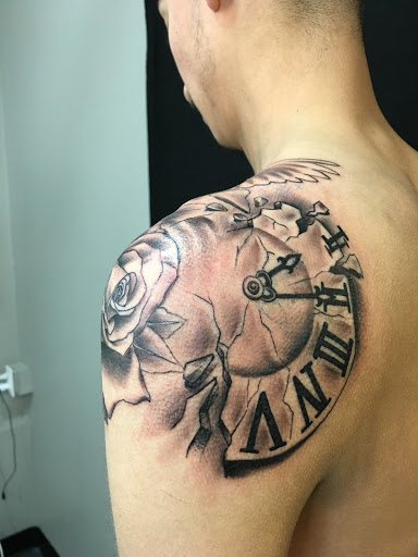 Explore boxing gloves tattoo ideas, creative tattoo ideas in Denver, available at Dreamscape Piercing and Tattoo LLC