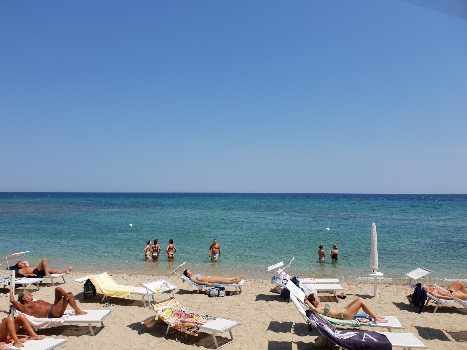 Fotografie cu Spiaggia San Cataldo - locul popular printre cunoscătorii de relaxare