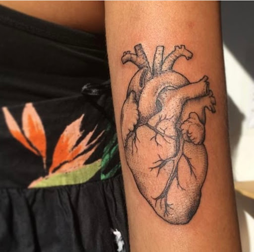 Explore small black tattoo ideas, creative tattoo ideas in Miami Beach, available at Salvation Tattoo Lounge