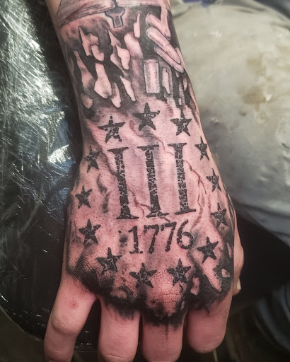 Explore dinosaur tattoo ideas for son, creative tattoo ideas in Lagrangeville, available at Black Cherry Tattoo Studio NY