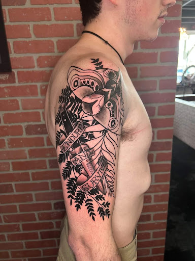 Explore hell hound tattoo ideas, creative tattoo ideas in Kissimmee, available at Fallen Heroes Tattoo & Piercing (Florida)