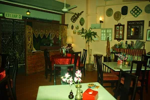 CHELLA'S RESTAURANT - Western & Indian Cuisine. image