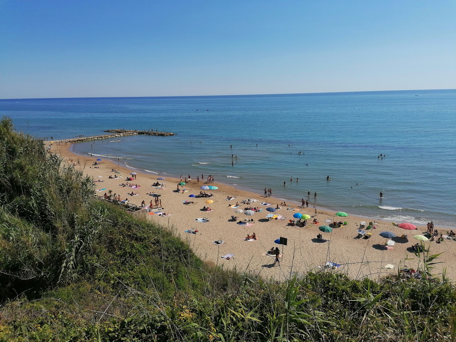 Photo of Lido delle Sirene with blue water surface