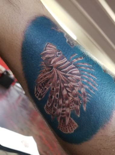 Explore tattoo filler ideas for a woman, creative tattoo ideas in Daytona Beach, available at Studio 21 Tattoo & Piercings Daytona Beach